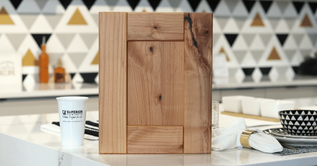 the Manhattan door in rustic knotty alder, natural stain by superior cabinets
